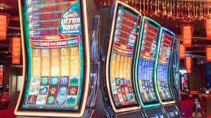 Studio live ortugaming dengan dealer profesional menjalankan permainan Sic Bo